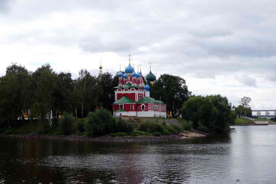 A day after leaving Moscow, travelers can see colorful churches along the forested banks of the Volga.