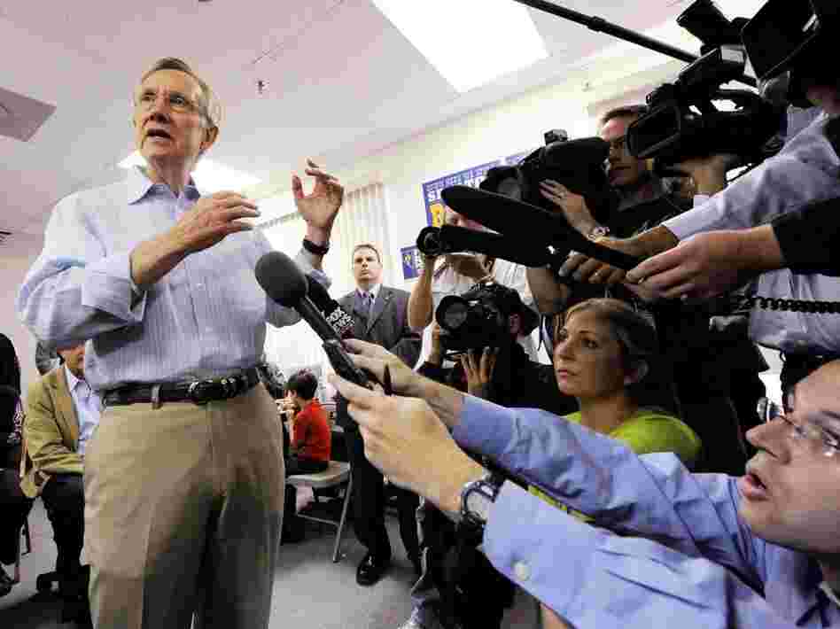 Harry Reid talks to the media