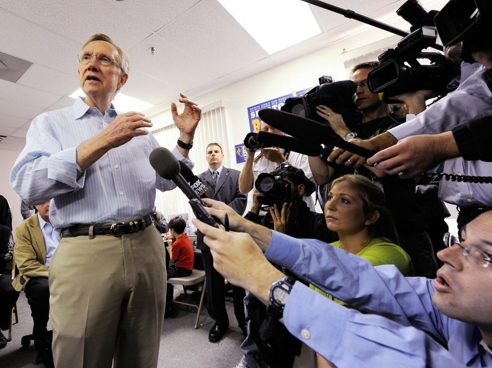 Harry Reid talks to the media