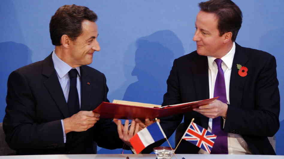 cameron ad sarkozy sign treaty cameron ad sarkozy sign treaty