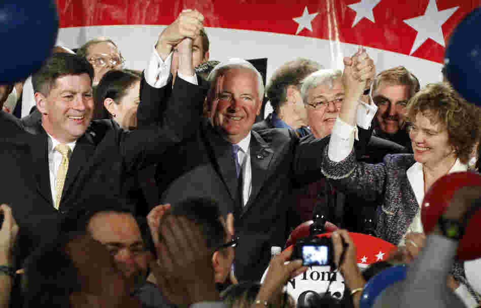 Pennsylvania Gov.-elect Republican Tom Corbett (center) and his wife, Susan (right), celebrate with Lt. Gov.-elect Jim Cawley (left) after defeating Democrat Dan Onorato. 