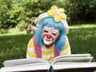 Clown reading