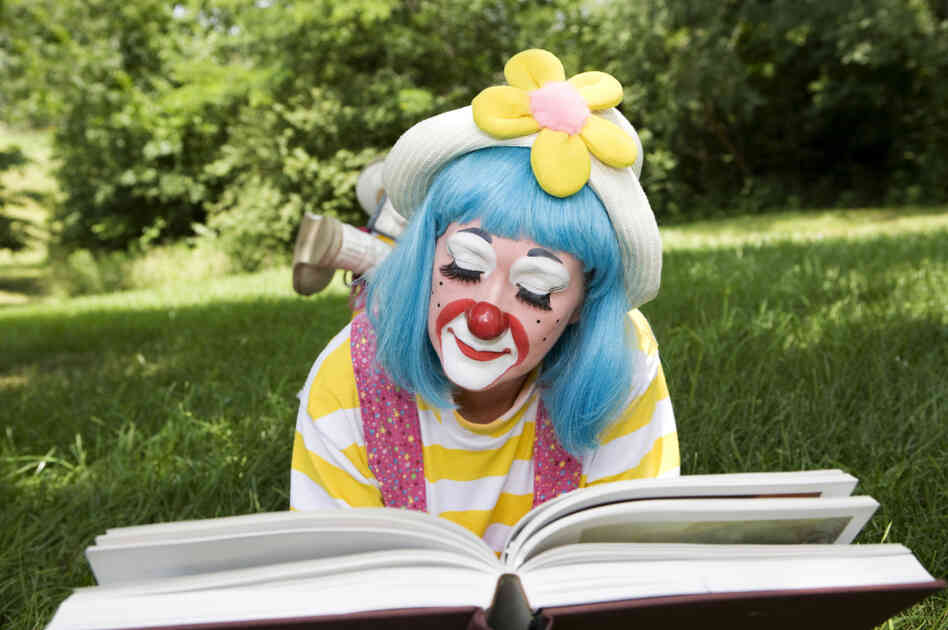 Clown reading Clown reading