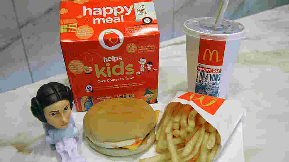 A McDonald's Happy Meal with a Star Wars figure.