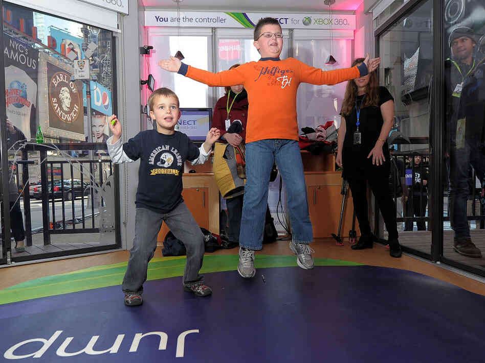 Kids play with the Kinect for Xbox 360 during a launch event in New York City. Kids play with the Kinect for Xbox 360 during a launch event in New York City.