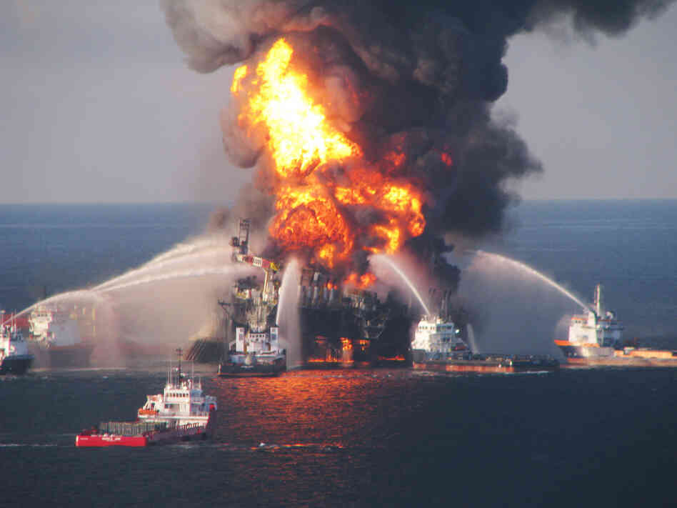 Boats battle a fire at the offshore oil rig Deepwater Horizon in April. Boats battle a fire at the offshore oil rig Deepwater Horizon in April.