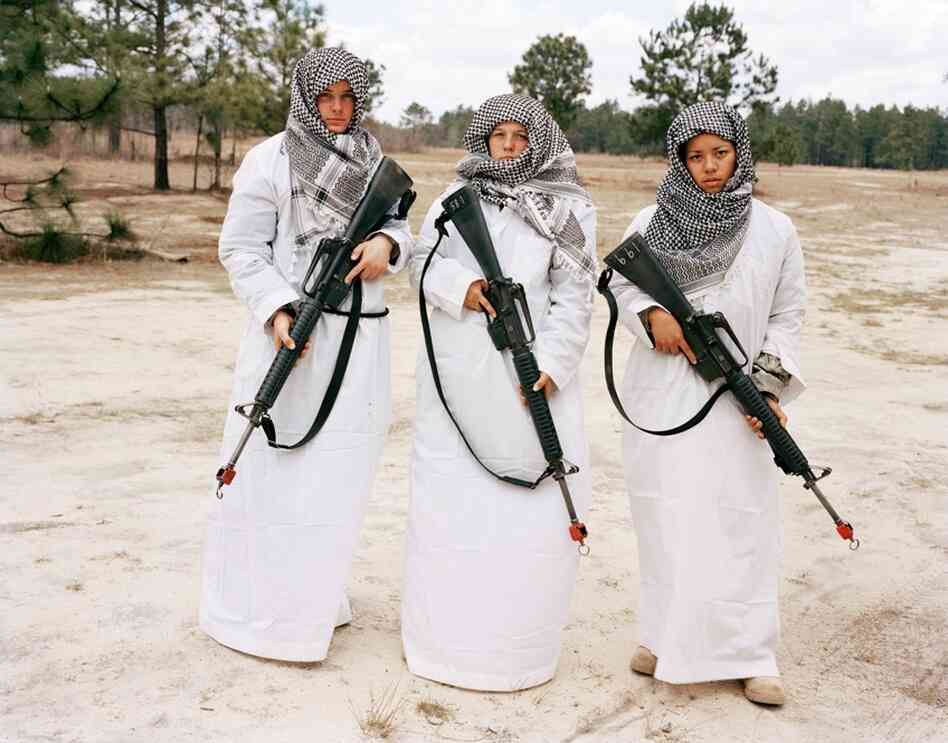 In her series, Simulating Iraq, Claire Beckett documents the fabricated spaces designed to mimic Iraq and Afghanistan in the U.S. for military training. The simulations include specific architecture as well as objects and costumes, for Americans who role-play as Iraquis and Afghans.