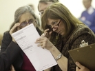 Alaska election officials inspect ballot Alaska election officials inspect ballot