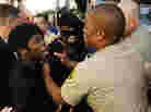 Sheriff's deputies scuffle with members of the Black Riders Liberation Front 