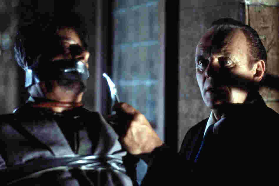 Anthony Hopkins (right) and Giancarlo Giannini in a scene from Hannibal.  