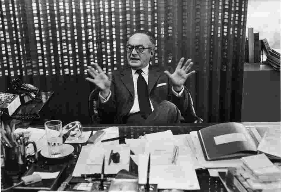 De Laurentiis is interviewed in his office, circa 1970. 