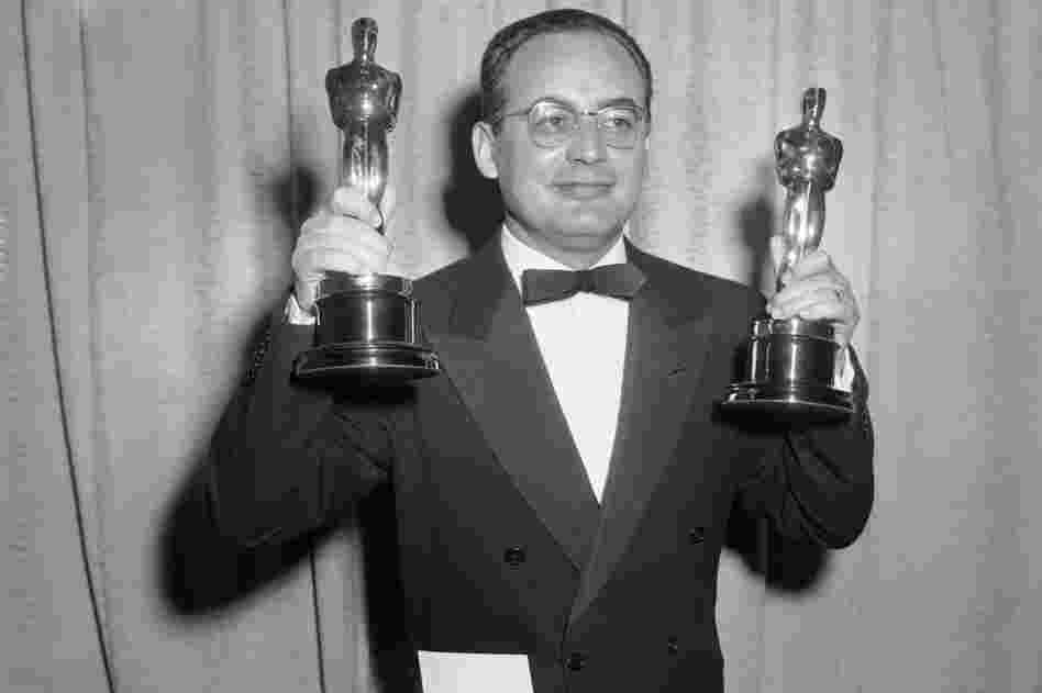 Dino De Laurentiis, 91, died Wednesday, at his home in Beverly Hills, Calif. He was head of a film empire and a two-time Academy Award winner with a string of successful films. Above, De Laurentiis holds the Oscars awarded to him and Carlo Ponti in 1957 for the best foreign language film, La Strada, at the Academy Awards.  
