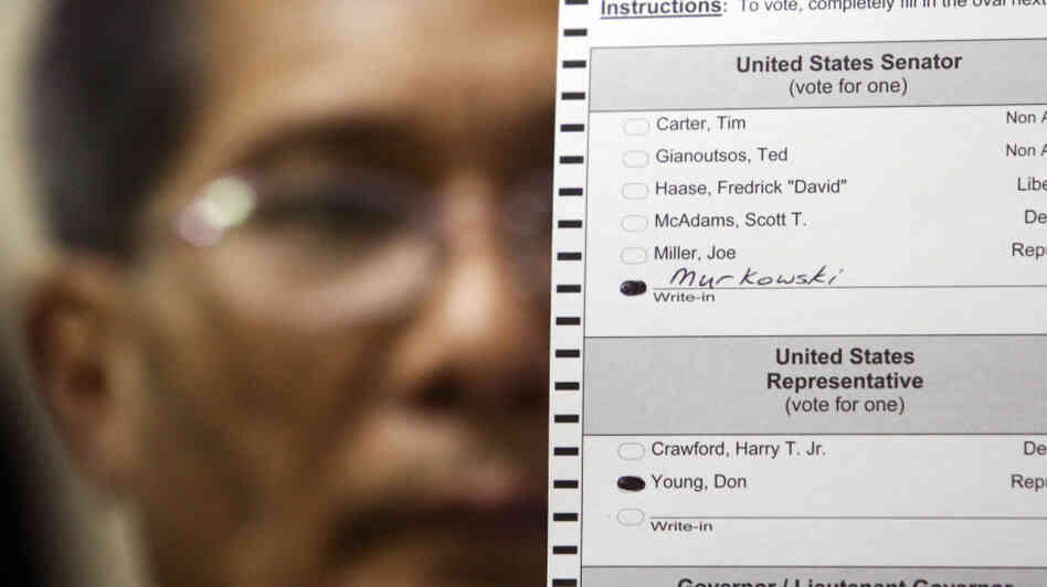 Hand Count Board member Alden Balalong holds up a write-in ballot marked "Murkowski." Hand Count Board member Alden Balalong holds up a write-in ballot marked "Murkowski."