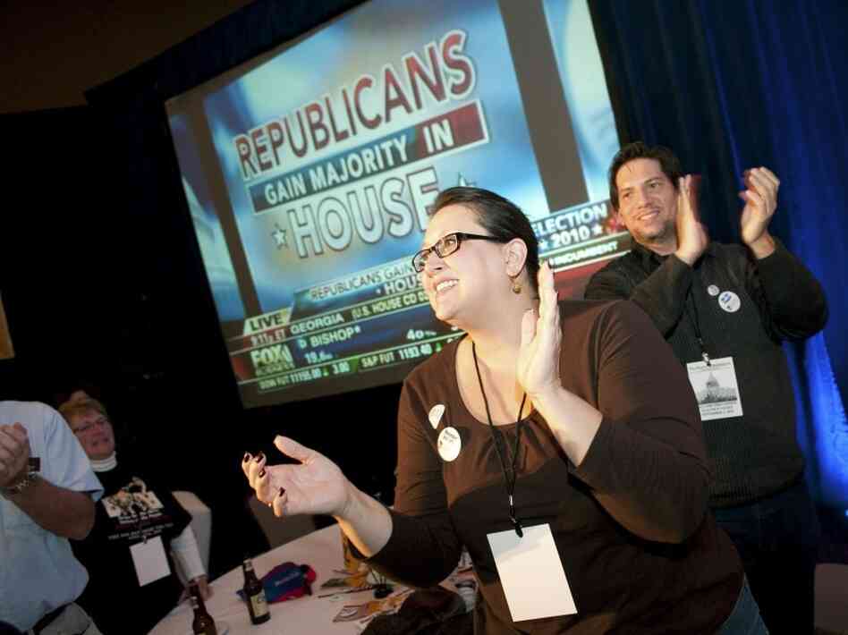 Attendees at a Tea Party election results events at a Washington, D.C., hotel cheer on Nov. 2. Attendees at a Tea Party election results events at a Washington, D.C., hotel cheer on Nov. 2.