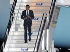 US President Barack Obama disembarks from the Air Force One upon his arrival in Tokyo, ahead of the US President Barack Obama disembarks from the Air Force One upon his arrival in Tokyo, ahead of the