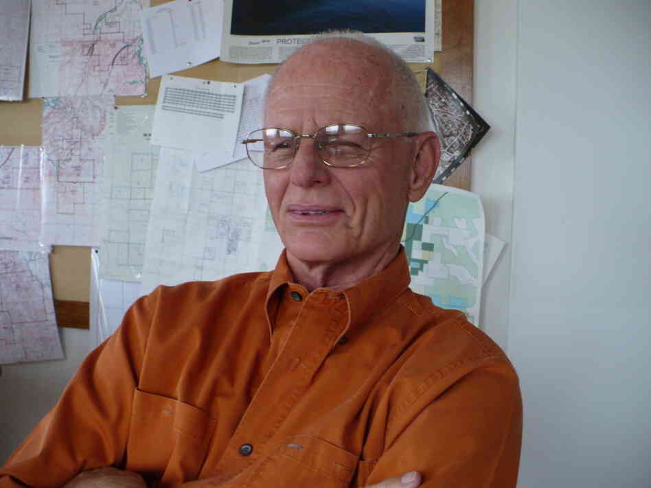 Bill Haw, a Kansas rancher and businessman, speaks in front of a wall holding maps of his land. Bill Haw, a Kansas rancher and businessman, speaks in front of a wall holding maps of his land.