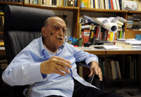 Niemeyer speaks to the press on his 102nd birthday in his studio in Rio de Janeiro, Dec. 15, 2009.