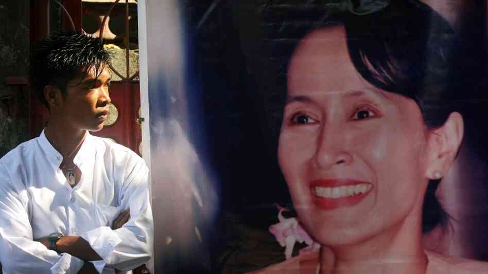 In Yangon today, Aung San Suu Kyi's portrait hung outside her party's headquarters. In Yangon today, Aung San Suu Kyi's portrait hung outside her party's headquarters.