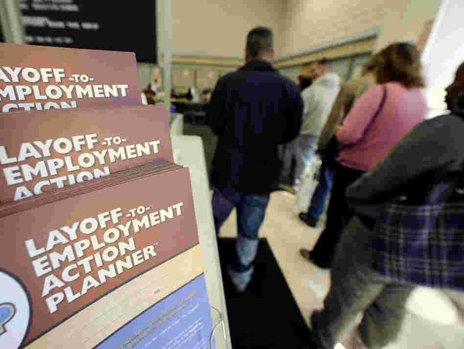 Job-seekers wait in line at a government-run employment center in Las Vegas. Job-seekers wait in line at a government-run employment center in Las Vegas.