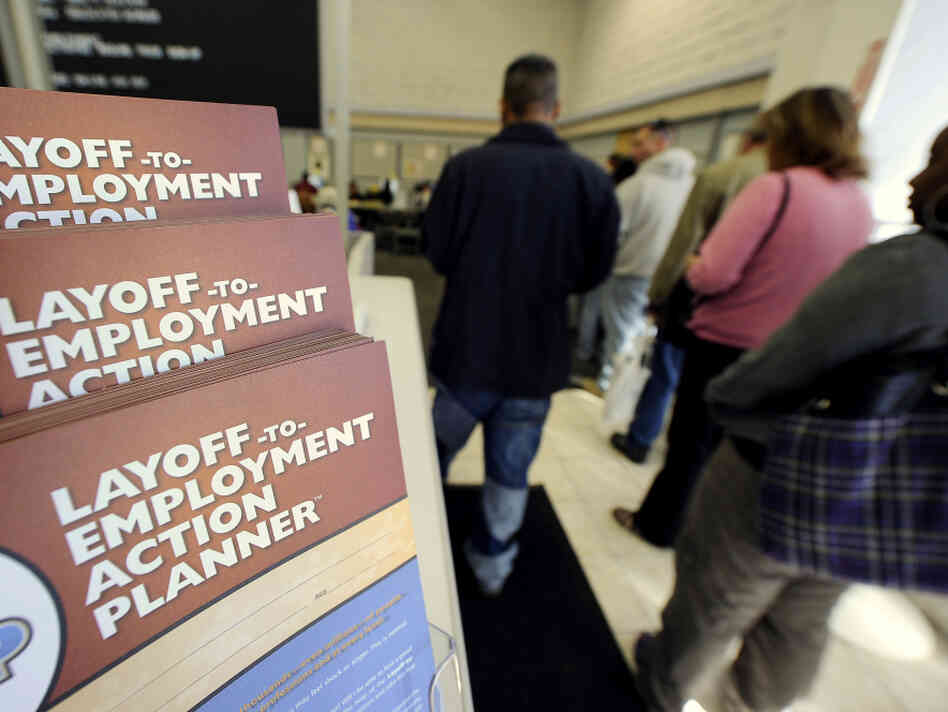 Job-seekers wait in line at a government-run employment center in Las Vegas. Job-seekers wait in line at a government-run employment center in Las Vegas.