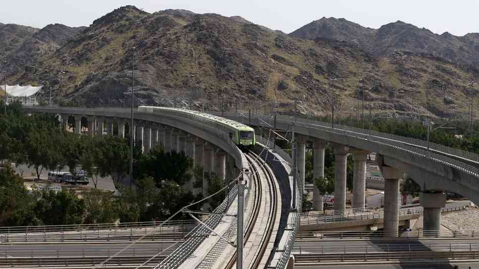 A Mecca Metro train arrives at a station in Mina ahead of the Hajj main ritual at Mount Arafat outsi A Mecca Metro train arrives at a station in Mina ahead of the Hajj main ritual at Mount Arafat outsi