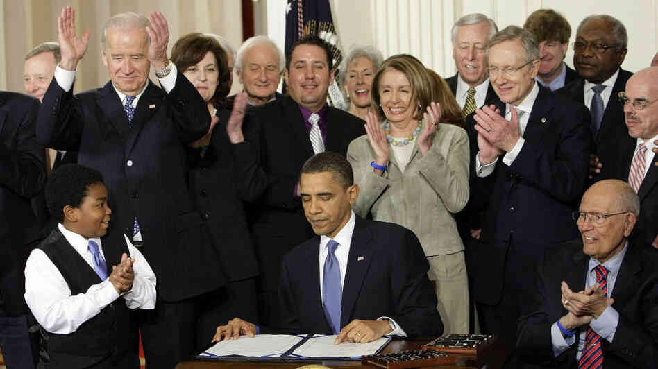 President Obama at the signing of the health care bill. President Obama at the signing of the health care bill.
