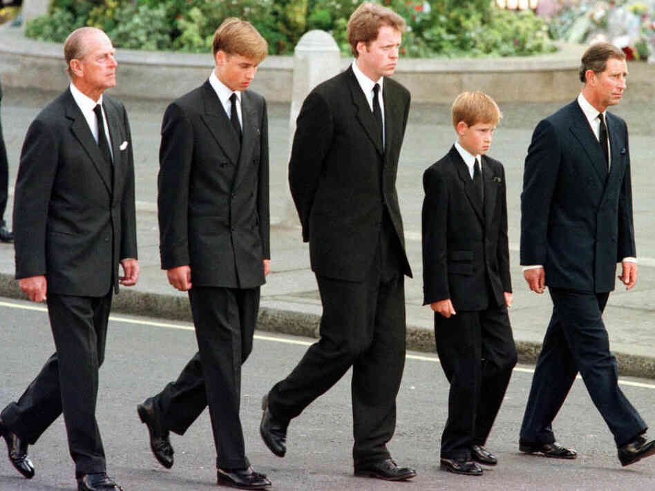 Prince Charles walks with his family outside Westminister Abbey after Princess Diana's funeral. Prince Charles walks with his family outside Westminister Abbey after Princess Diana's funeral.