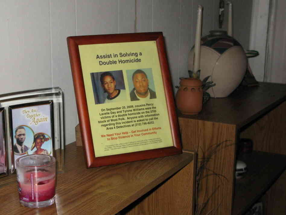 A framed flier with portraits of Percy Lavelle Day and Tyrone Williams