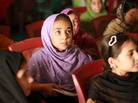 Young girls learn how to converse in English at the Afghan-Canadian Community Center in Kandahar. Young girls learn how to converse in English at the Afghan-Canadian Community Center in Kandahar.