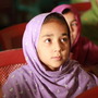 Young girls learn how to converse in English at the Afghan-Canadian Community Center in Kandahar.