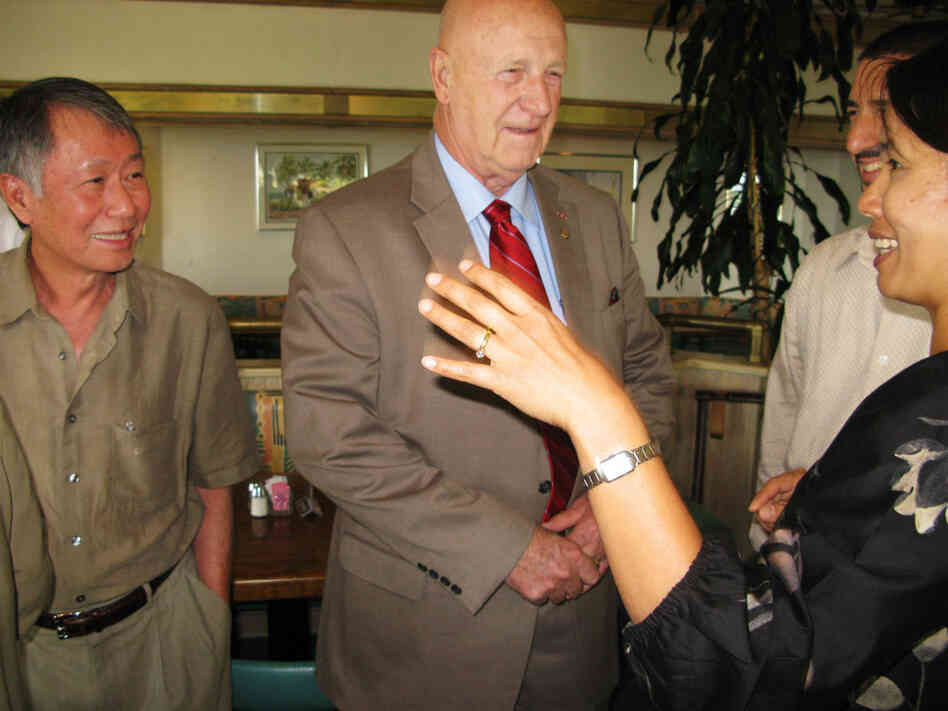 Paul Jacobs, captain of the USS Kirk, reunites with the Le family Paul Jacobs, captain of the USS Kirk, reunites with the Le family
