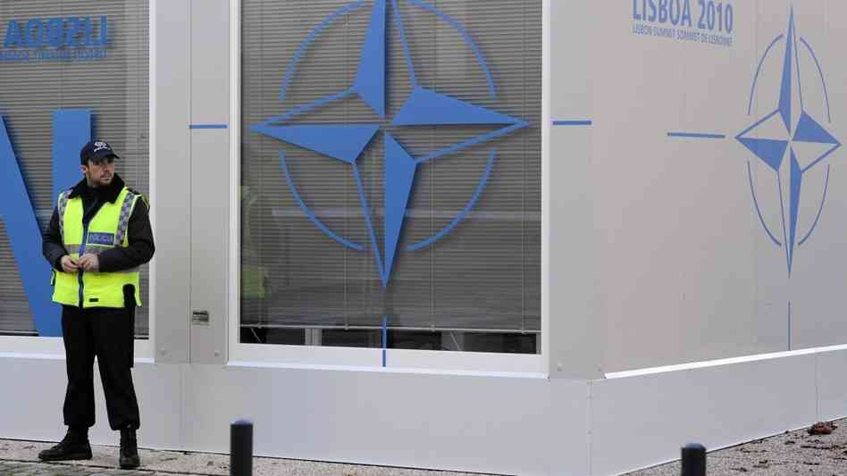 A policeman stands guards at the NATO summit. A policeman stands guards at the NATO summit.