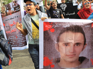 Egyptian youths demonstrate against the death of Khaled Said, allegedly at the hands of police Egyptian youths demonstrate against the death of Khaled Said, allegedly at the hands of police