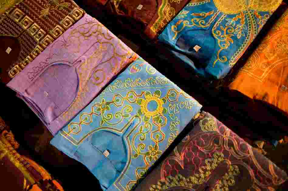 Embroidered shirts are available on the streets of the Ataba district. The black market is a concern to Egyptian businessmen doing business legally, as it cuts into their profits.
