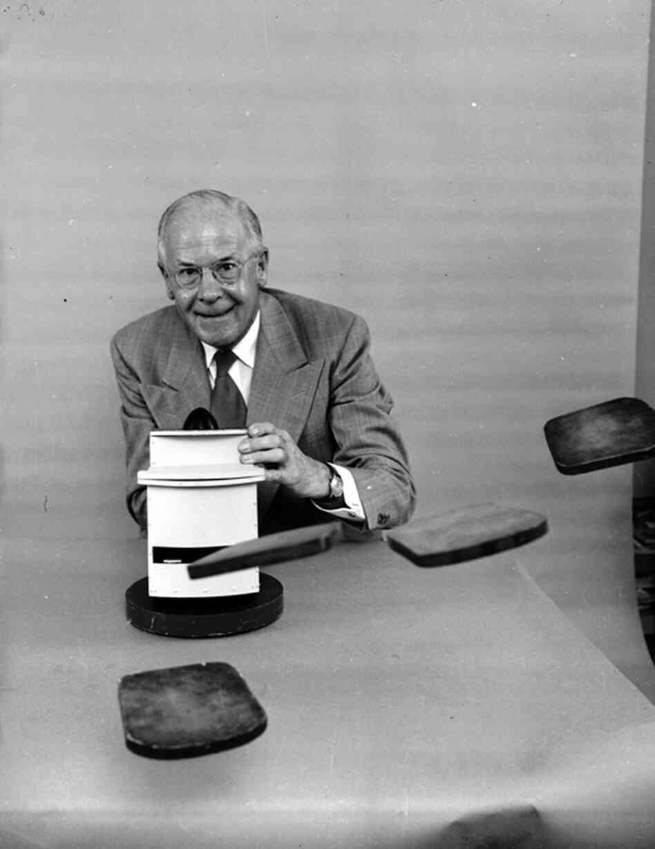 Oakes poses with his 'pop at you' toaster which ejects toast forcefully and horizontally. 