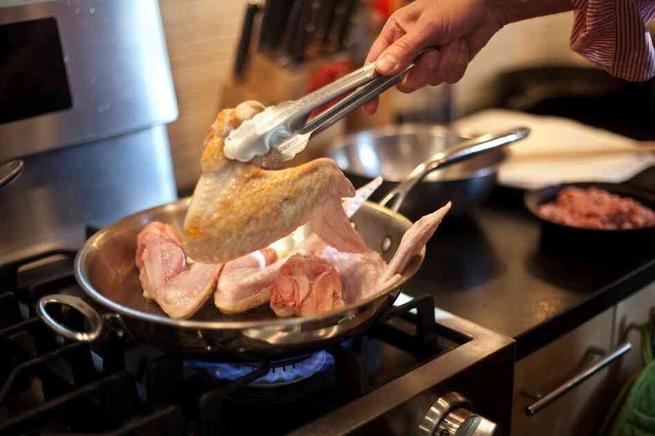 Without a whole turkey in which to put stuffing, Kimball also explained how to get that in-the-bird flavor for pan-baked stuffing.
