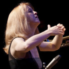Maria Schneider conducts at the 2009 Mary Lou Williams Women in Jazz Festival. Maria Schneider conducts at the 2009 Mary Lou Williams Women in Jazz Festival.