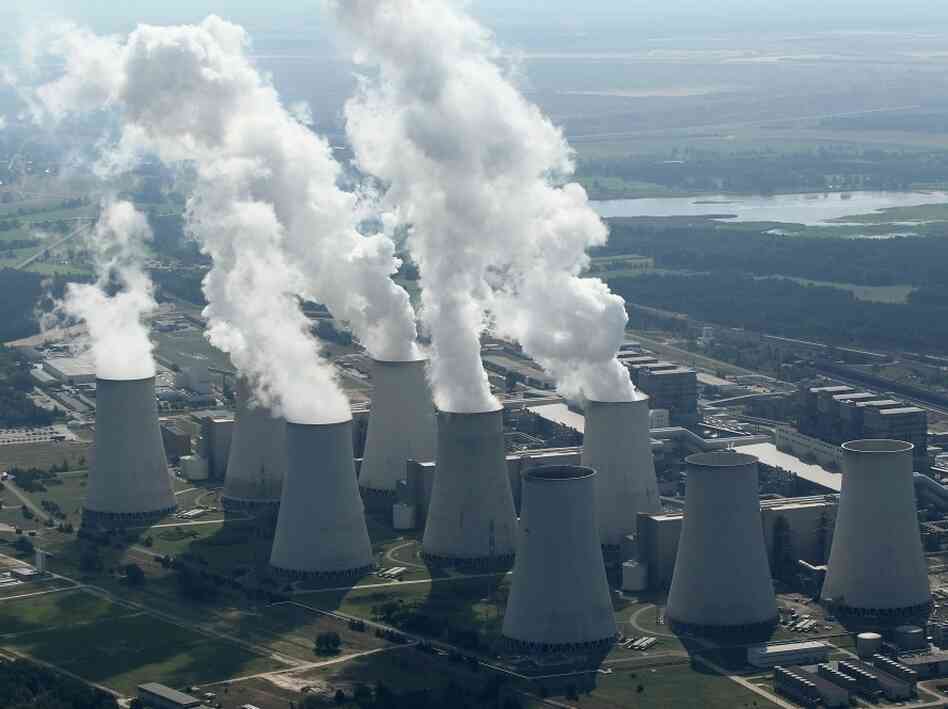 Steam rises from cooling towers at the Jaenschwalde coal-fired power plant in Germany Steam rises from cooling towers at the Jaenschwalde coal-fired power plant in Germany