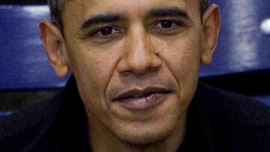 President Obama displays his stitches while watching a basketball game between Oregon State and Howa President Obama displays his stitches while watching a basketball game between Oregon State and Howa