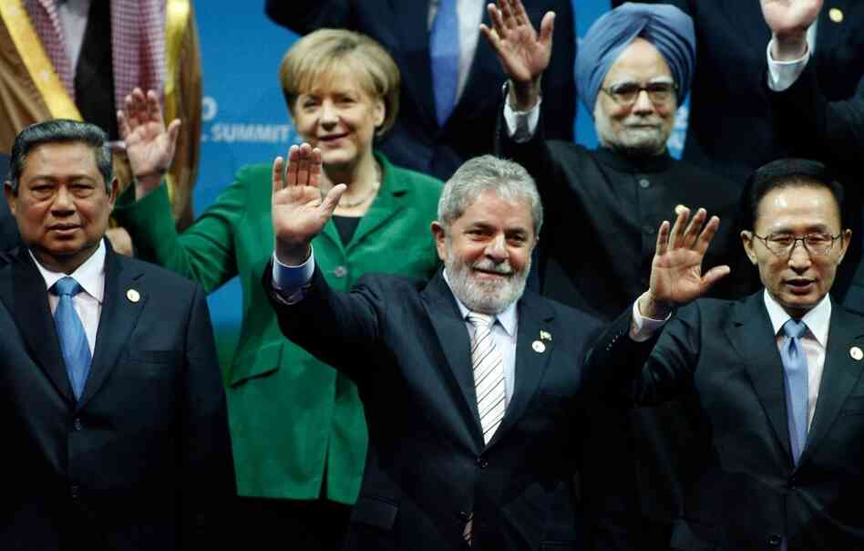World leaders wave during the G20 Summit in Seoul. World leaders wave during the G20 Summit in Seoul.