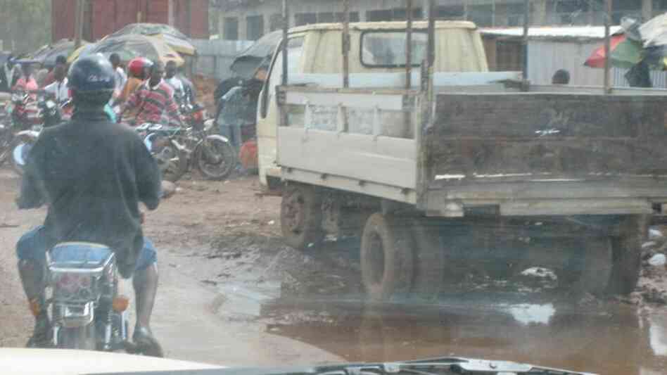 The view from inside a vehicle of the muddy road in the Red Light market of Paynesville, Liberia. The view from inside a vehicle of the muddy road in the Red Light market of Paynesville, Liberia.