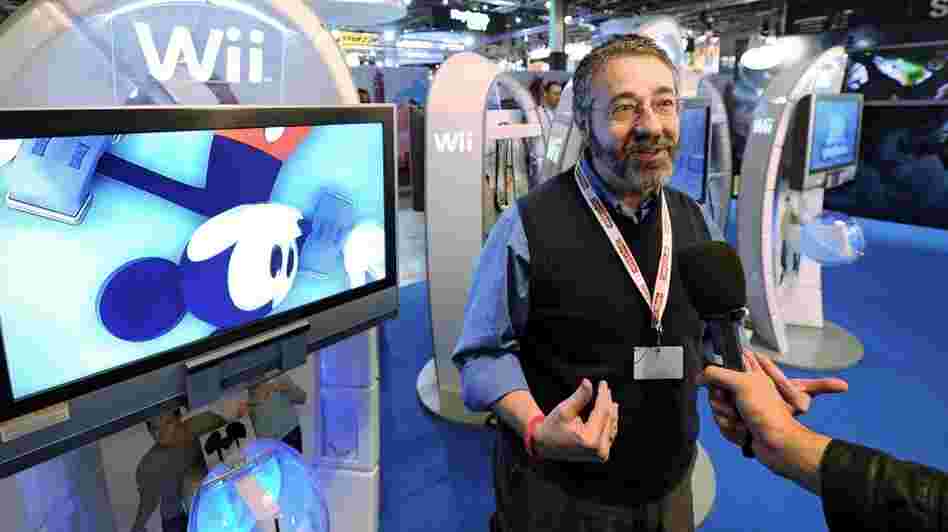 Mickey Mouse and Warren Spector. Mickey Mouse and Warren Spector.