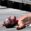 A man sunbathes in Malmo on July 8, 2010. 