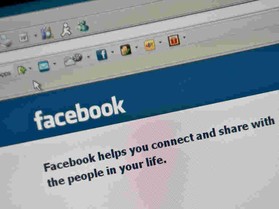 The Facebook homepage is seen on a computer screen. The Facebook homepage is seen on a computer screen.