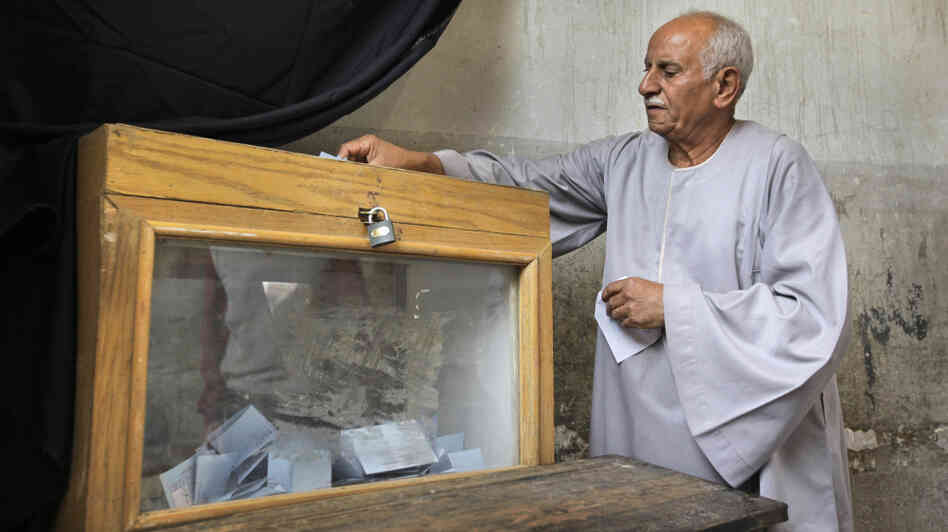 An Egyptian man in Cairo casts his vote in parliamentary elections, Nov. 28, 2010 An Egyptian man in Cairo casts his vote in parliamentary elections, Nov. 28, 2010