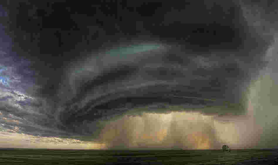 A swirling thunderstorm in Montana. A swirling thunderstorm in Montana.