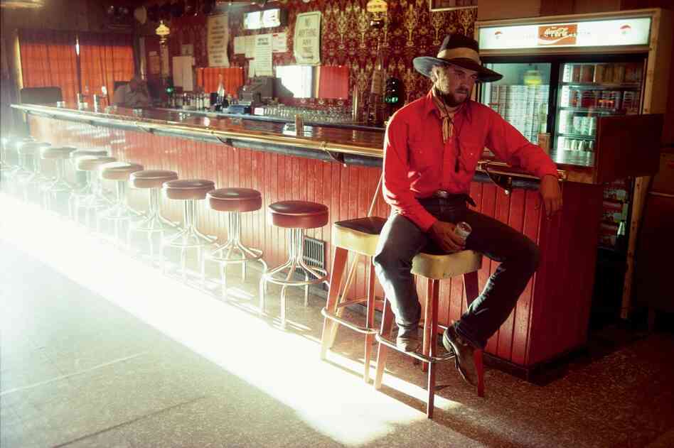 Ranch buckaroo Stan Kendall at the bar, Mountain City, Nevada 1979