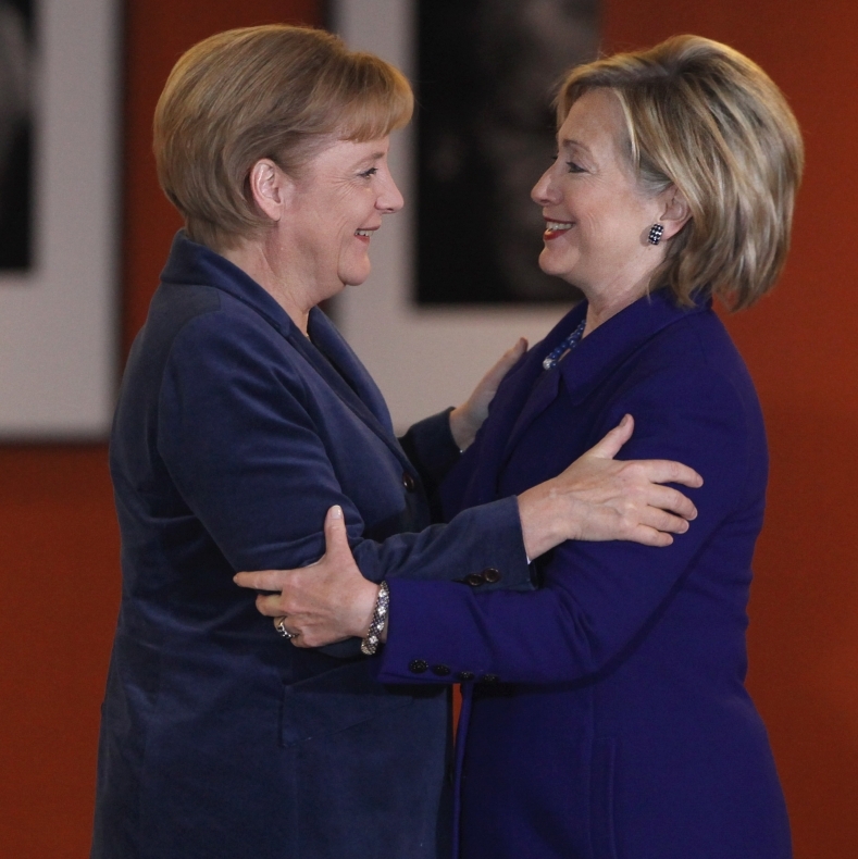 German Chancellor Angela Merkel greets U.S. Secretary of State Hillary Clinton