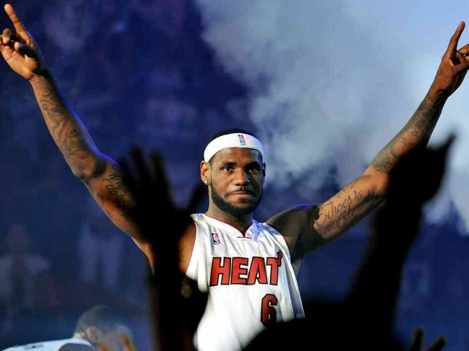 LeBron James of the Miami Heat greets fans LeBron James of the Miami Heat greets fans