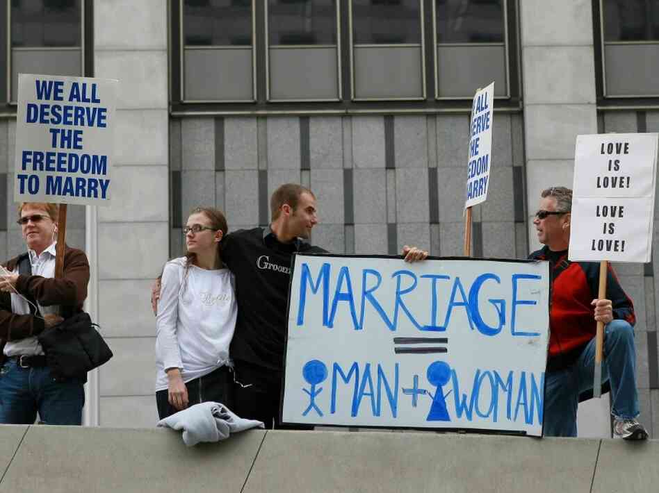 Supporters of Proposition 8 stand between opponents of the measure in San Francisco in August. Supporters of Proposition 8 stand between opponents of the measure in San Francisco in August.